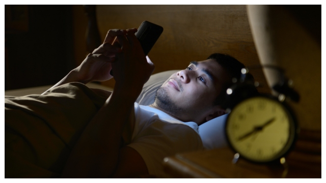 Why You Shouldn’t Be on Your Phone Before Bed — Even If It’s Your “Me Time”